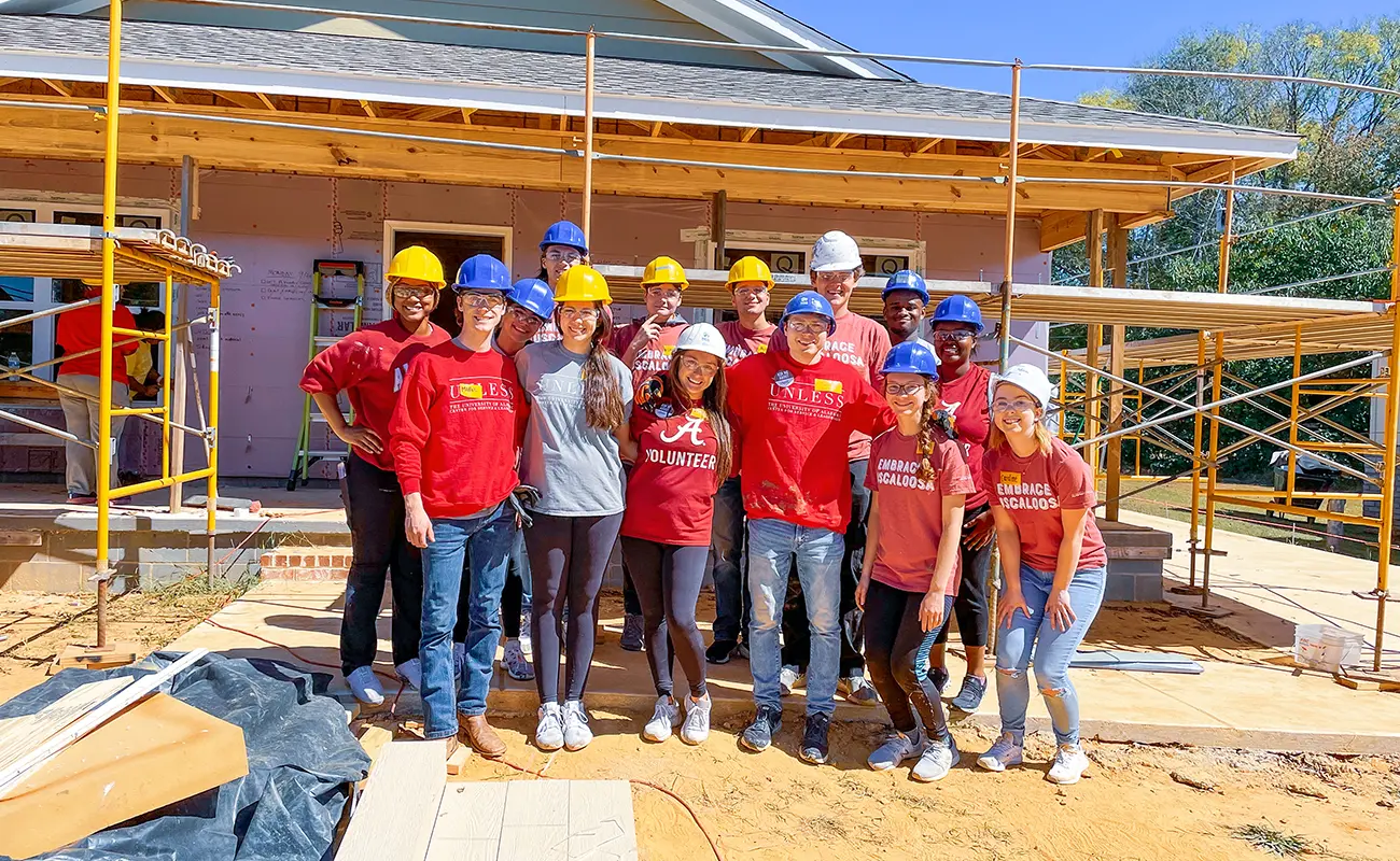 UA Habitat members at a house build